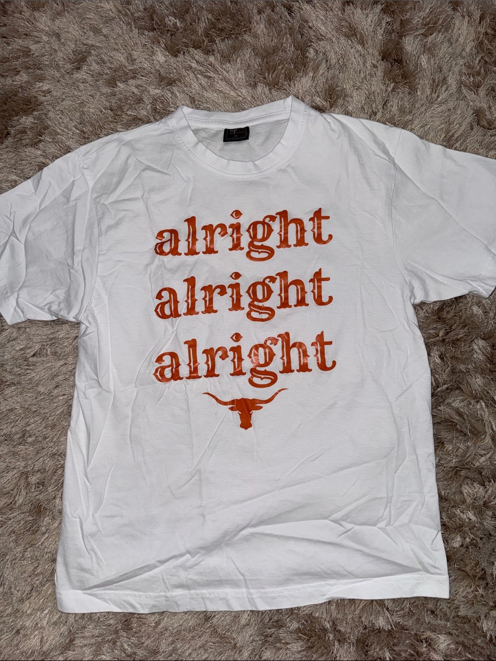 White Graphic Tee with Orange 'alright' Text